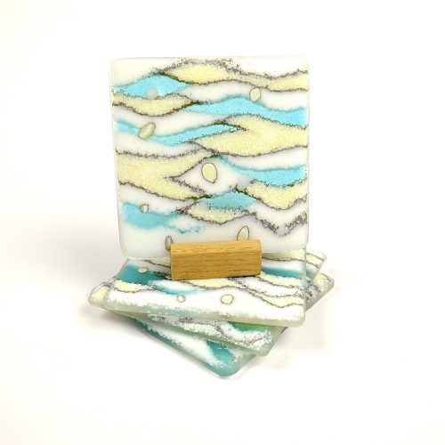 Fused glass coasters in turquoise and cream