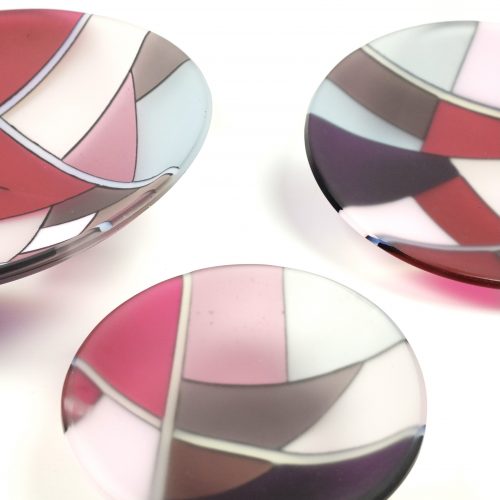 collection of matte pink glass bowls
