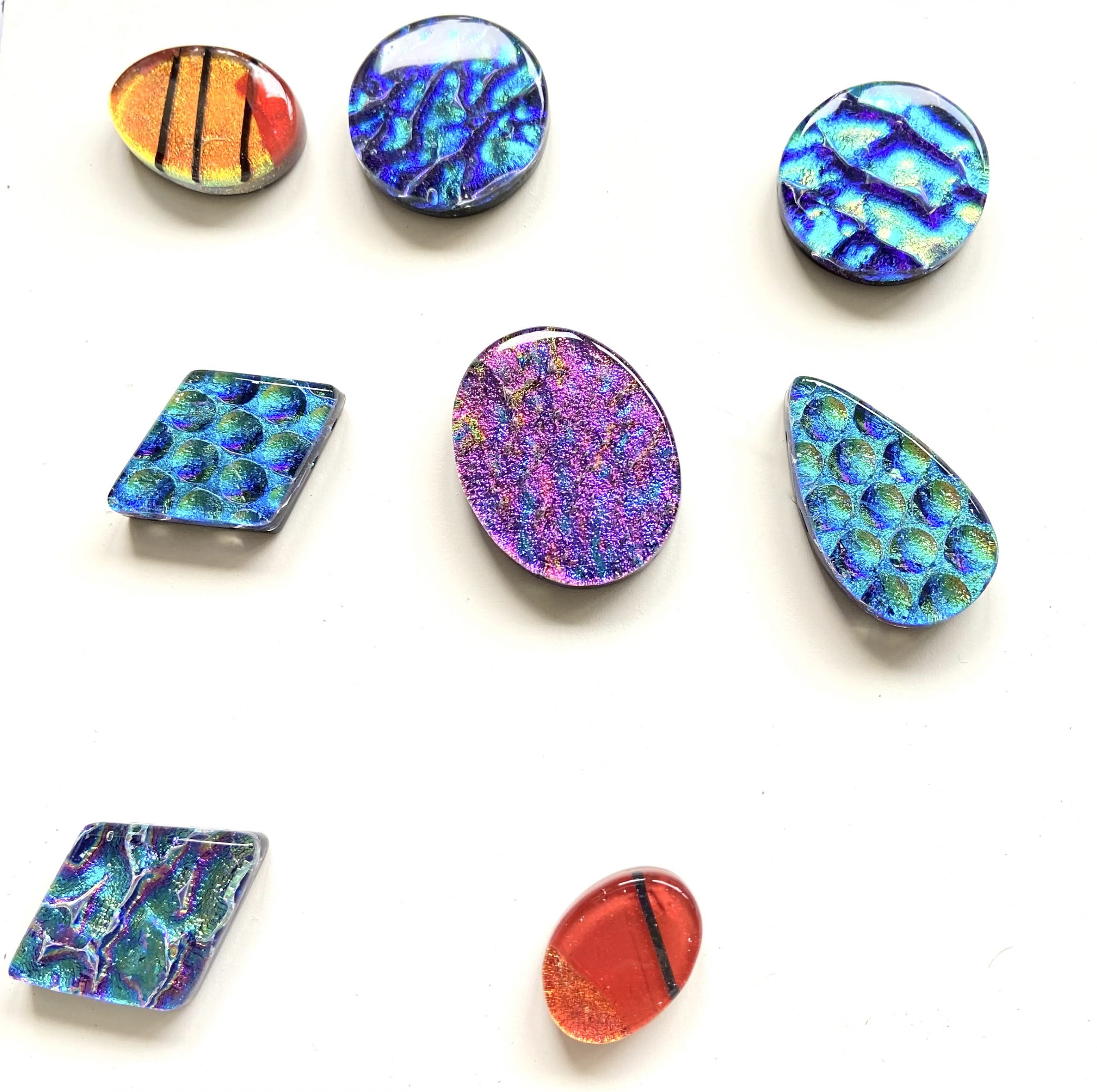 A range of dichroic cabochons