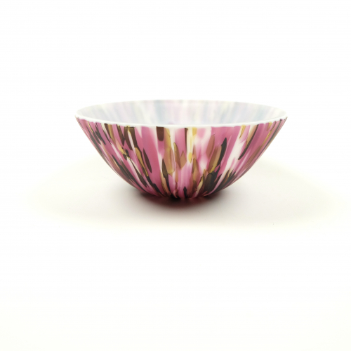 Side image of pink and yellow matte glass bowl